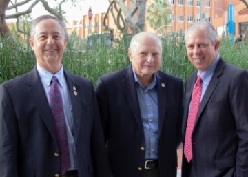 From left: James C. Wyant College of Optical Sciences Dean Thomas Koch, Professor Emeritus James C. Wyant, and University of Arizona President Robert C. Robbins.